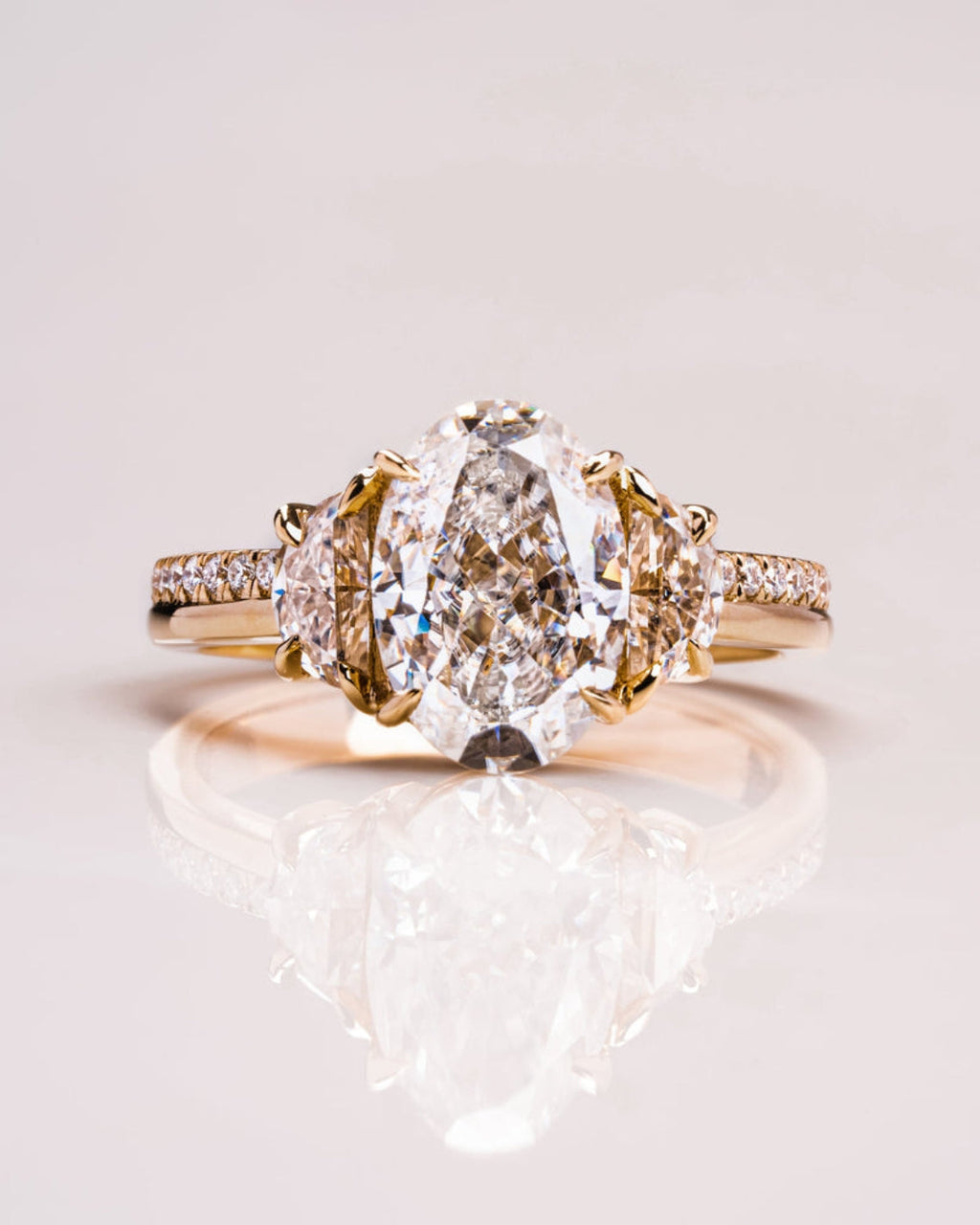 Oval Cut Lab Grown Diamond Three Stone Engagement Ring