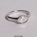 Oval Cut Lab Grown Diamond Bezel Engagement Ring