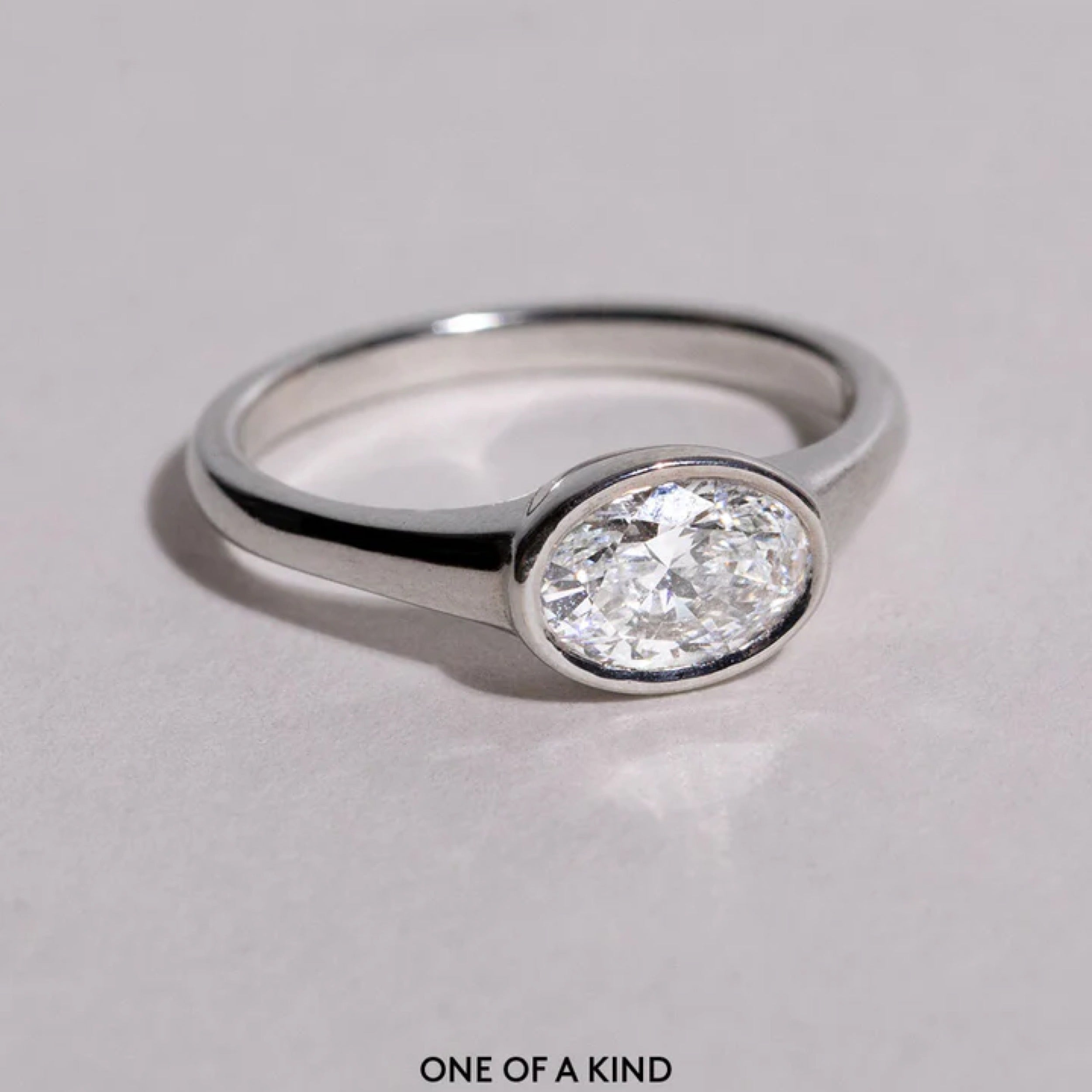 Oval Cut Lab Grown Diamond Bezel Engagement Ring
